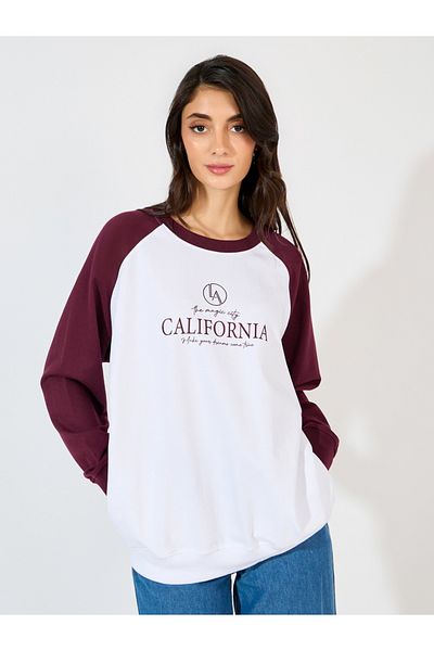 Styli Oversized Longline Slogan Print Sweatshirt