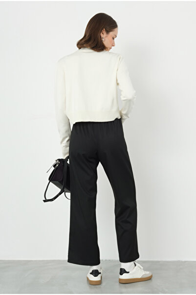 HEQA Чорні штани - з деталями швів спереду