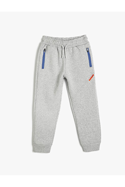 Koton Jogger Sweatpants with Pocket Detail and Tie Waist Drape