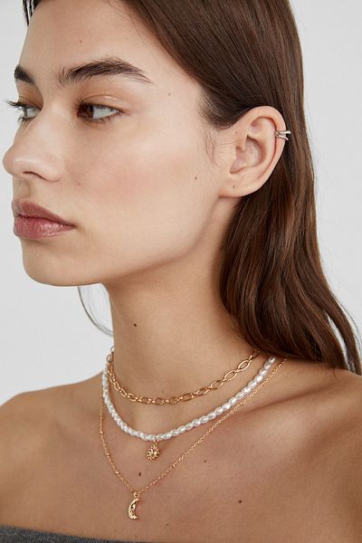 Stradivarius Set of 4 moon and sun necklaces