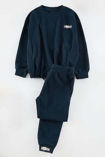 TRENDYOLKIDS Sötétkék fiú nyomott kötött alsó-felső öltöny TKDAW25AU00085
