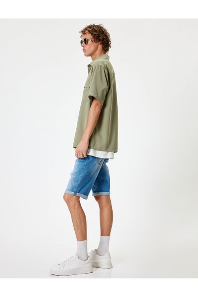 Koton Jeansshorts im Bermuda-Schnitt und schmaler Passform – mit Bündchen und Knopfleiste