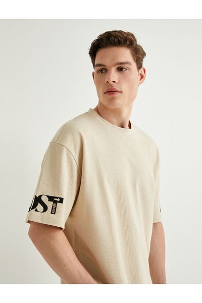 Koton Bavlněné oversize tričko – potištěný slogan, krátký rukáv, výstřih