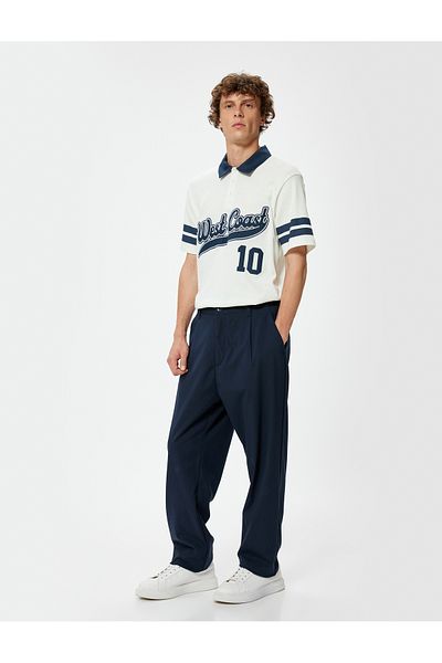 Koton Übergroßes, kurzärmliges College-T-Shirt aus Baumwolle mit Polokragen und Knopfdetails