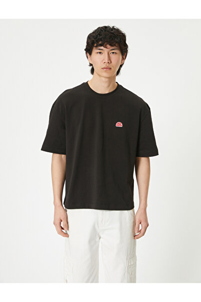 Koton Übergroßes bedrucktes T-Shirt mit Rundhalsausschnitt und kurzen Ärmeln