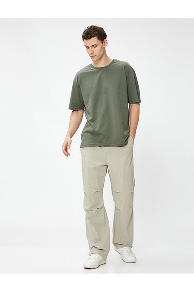 Koton Basic-T-Shirt mit Rundhalsausschnitt und kurzen Ärmeln aus Baumwolle