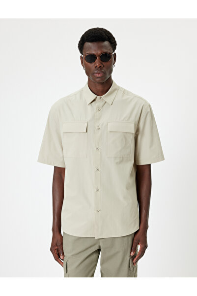 Koton Kurzarmhemd mit klassischem Kragen – Taschendetail und Knopf