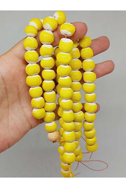 Yasamtohumu Жовті керамічні намистини з секретом 10-12 мм/23 см (54150)