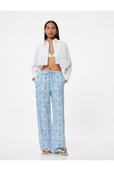 Koton Floral Patterned Comfortable Fit with High Waist and Tie Detail - Wide Leg Trousers