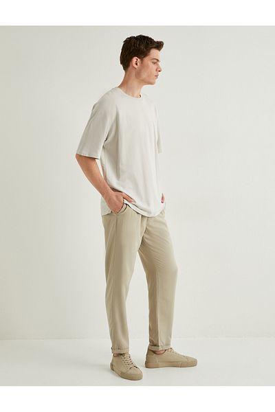 Koton Gabardine-Hose mit Bindegürtel in der Taille und Taschendetail