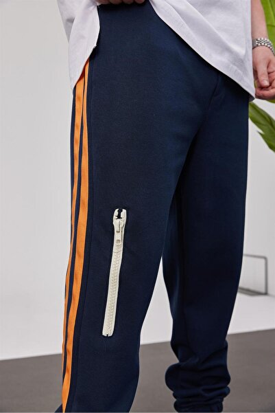 NOMARC Μπλε αθλητική φόρμα με πορτοκαλί ρίγες στο πλάι