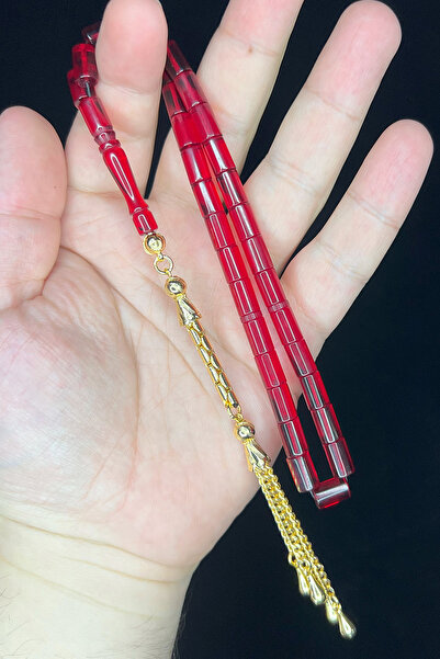 isfahantakı 1.Sınıf lüx 7x11 mm kesme altın kaplama püsküllü ateş kehribar