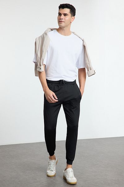Trendyol Collection Színes blokk fekete sport melegítőnadrág - normál szabású TMNAW25EA00030