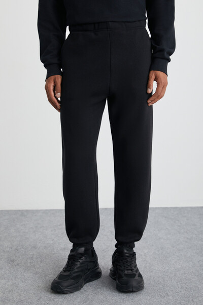 GRIMELANGE Ανδρικό παντελόνι από οργανικό ύφασμα Burnham με φλις εσωτερικά, χαλαρή εφαρμογή, ελαστικό πόδι Jogger μαύρο φούτερ