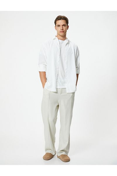 Koton Chinostoff aus Leinenmischung – Lockere Hose mit elastischem Bund, entspannter Passform und Taschendetail
