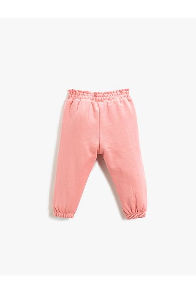 Koton Pantaloni de sport roz pentru fetiță 3WMG40175AK