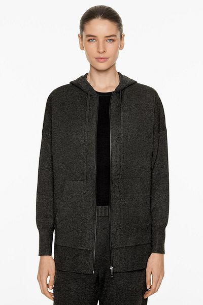Oysho Knit hooded jacket with front zip fastening. Side pocket details.
