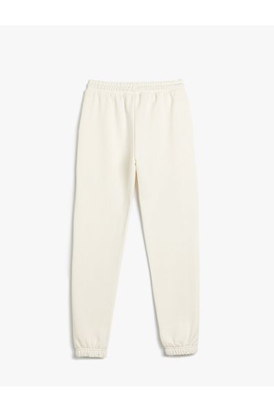 Koton Pocketed Jogger Sweatpants - Waist Tied and Applique Detailed