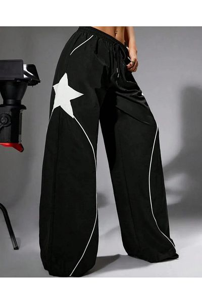 DENİKK Yudoowear, μαύρο πλεκτό παντελόνι φούτερ με αστεράκι.