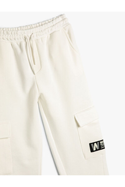 Koton Basic-Jogger-Jogginghose mit Taschendetail und Bindebund