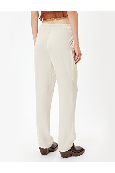 Koton Havuç Kesim Kumaş Pantolon Aerobin Saten Cepli Pile Detaylı