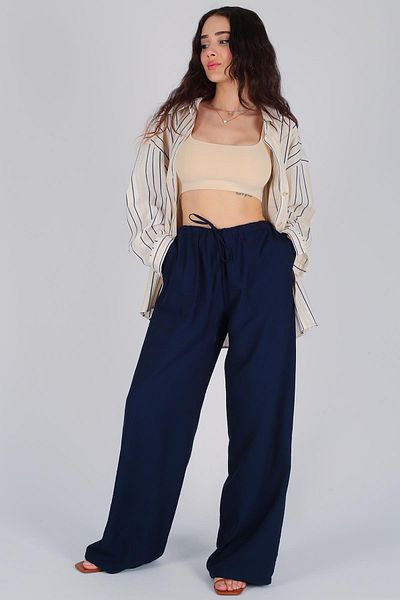FACETTE Pantaloni de damă cu șireturi bleumarin - picior lat