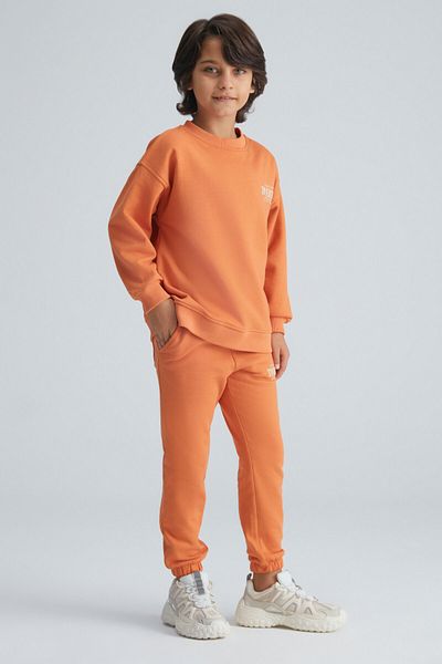 GRIMELANGE Skylar Jungen-Trainingsanzug-Set in Orange mit 3-fädigem Raster-Detail auf der Vorderseite und Rückseite