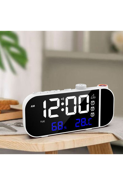 Choice ساعة منبه رقمية بيضاء مزودة براديو FM، وشاشة عرض لدرجة الحرارة والرطوبة. شركة سمارت ساوند.