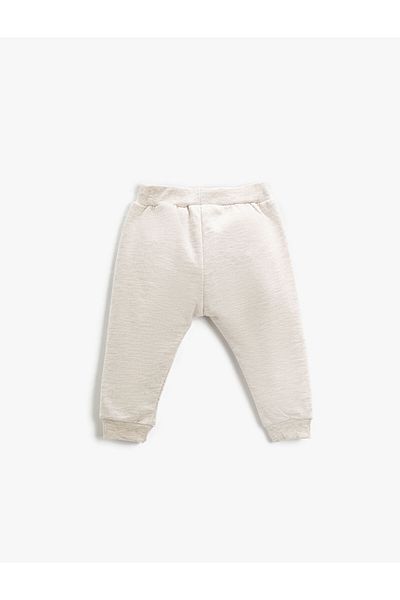 Koton Pantaloni de sport tip jogger cu talie elastică imprimați