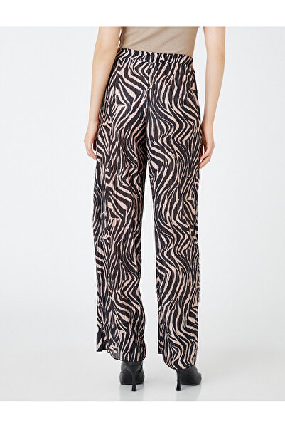 Koton Dámské černé vzorované kalhoty 3WAK40098EK