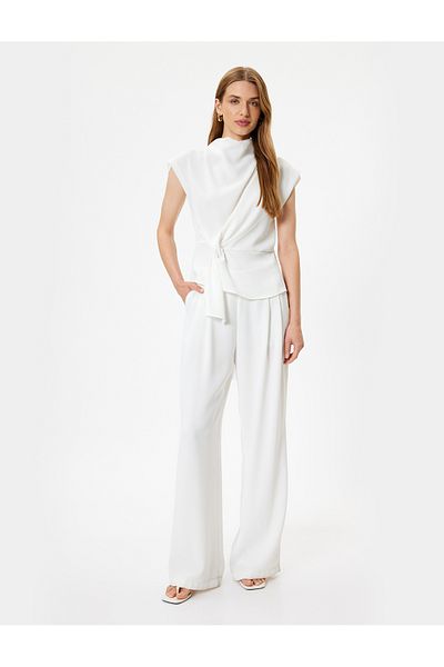 Koton Ärmellose Bluse mit Stehkragen und asymmetrischem Knoten-Detail