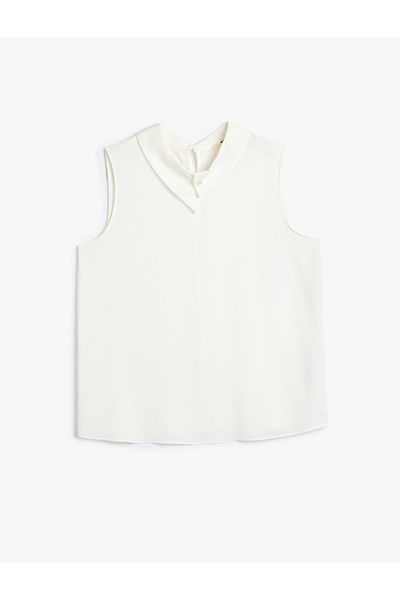 Koton Asymmetrische, ärmellose Bluse mit Hemdkragen und Knopfdetail