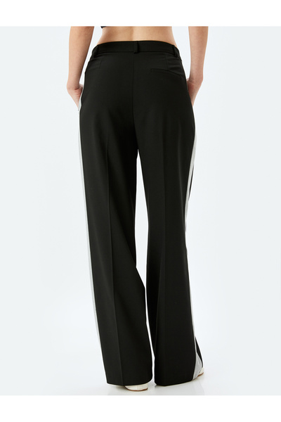 Koton Cepli Düz Bol Paça Yanları Şerit Detaylı Kumaş Pantolon