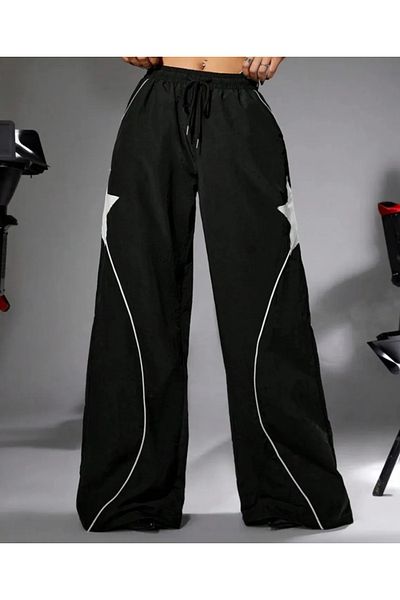 DENİKK Yudoowear, μαύρο πλεκτό παντελόνι φούτερ με αστεράκι.