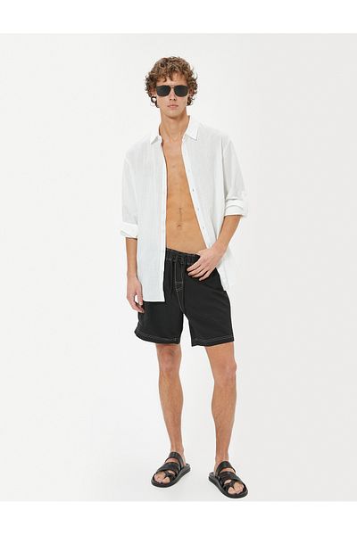 Koton Übergroße Badeshorts – Schnürung in der Taille und Nahtdetails