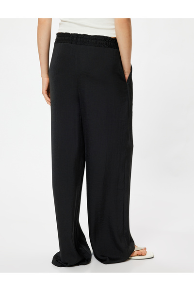 Koton Aerobin szövet – széles szárú, elasztikus derékrész, megkötött zsebes nadrág