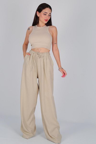 FACETTE Pantaloni de in bej - cu șireturi și picior largi