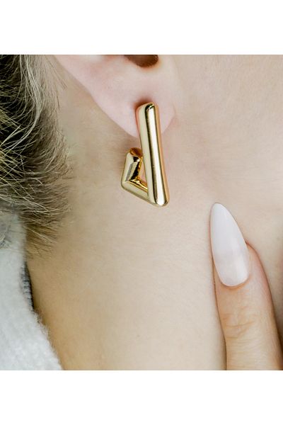 Store أقراط ذهبية غير متماثلة