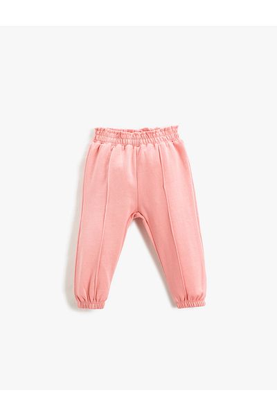 Koton Pantaloni de sport roz pentru fetiță 3WMG40175AK