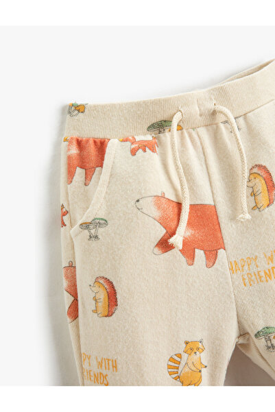 Koton Tepláky Jogger s mäkkou textúrou s vreckami a zaväzovacím pásom