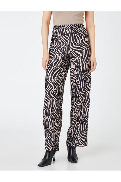 Koton Dámské černé vzorované kalhoty 3WAK40098EK