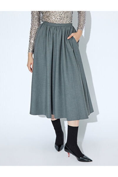 Koton Тканинна спідниця А-силуету довжини міді з кишенями волан