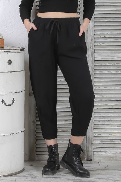 Chiccy Pantaloni negri din bumbac, cu buzunare duble, elastice și cu talie legată, cu picioare scurte