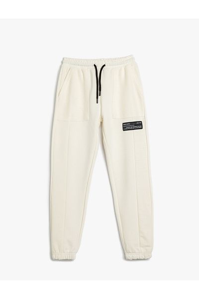 Koton Pocketed Jogger Sweatpants - Waist Tied and Applique Detailed