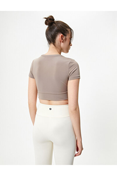Koton Sports Crop T-shirt με κοντό μανίκι Crew λαιμόκοψη ασύμμετρη κοπή, λεπτή εφαρμογή