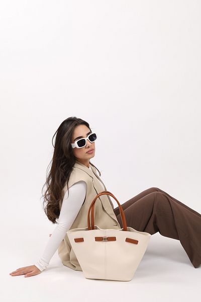NOTHING Women's Cream Tan Leather Hand and Shoulder Bag with Magnet Closure and Lock Detail