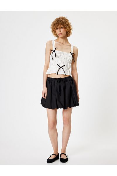 Koton X Tuba Unsal - Crop Top mit Schleife