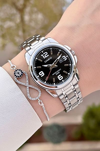 Casio Women's Wristwatch with Black Cord and Metallic Color