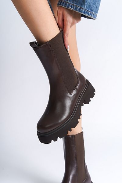 Capone Outfitters Lange Damenstiefel mit Trak-Sohle und seitlichem Gummizug