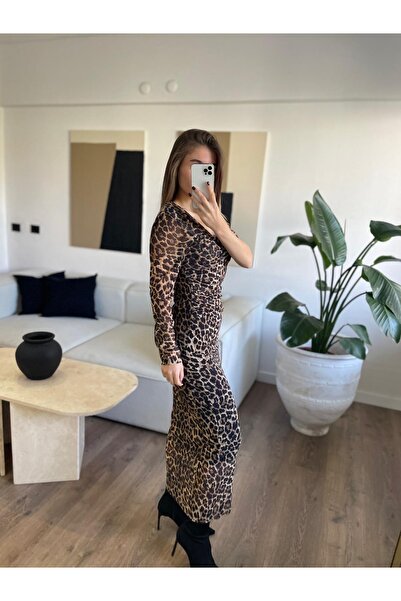 Özgece Leopar tasarım kol elbise